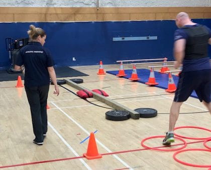 Becky Swan working with an officer of the Vancouver Police Department