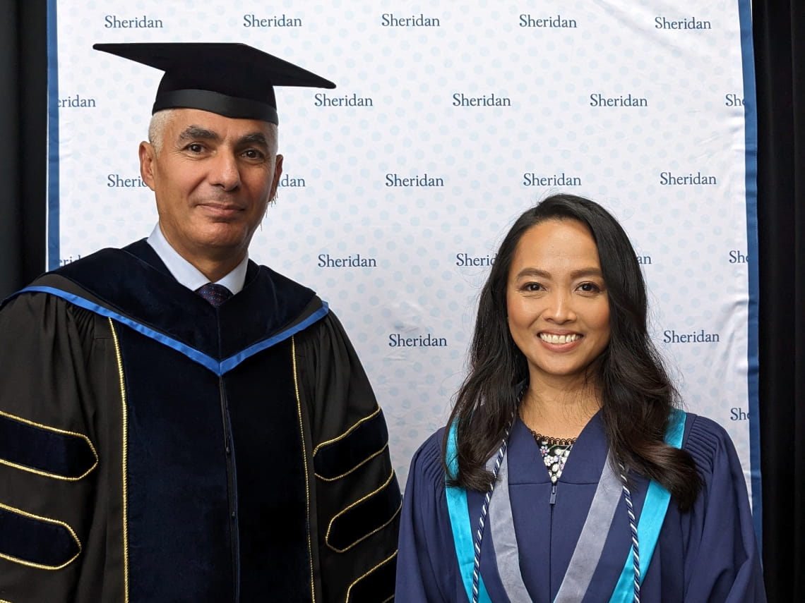 PSB Dean Muthana Zouri and valedictorian Monica Carbajal Bermeo