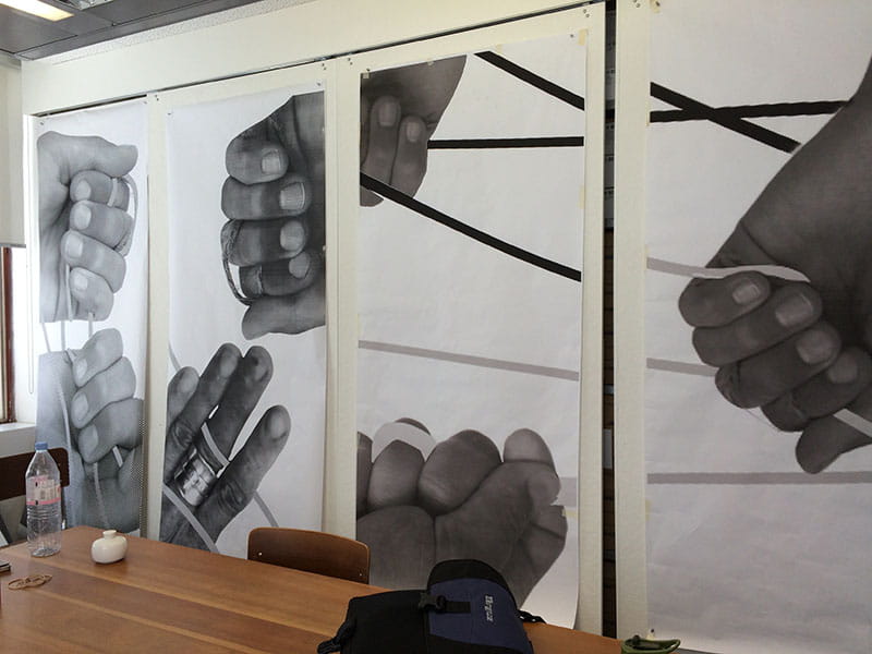 Hand imagery on Woven Stories