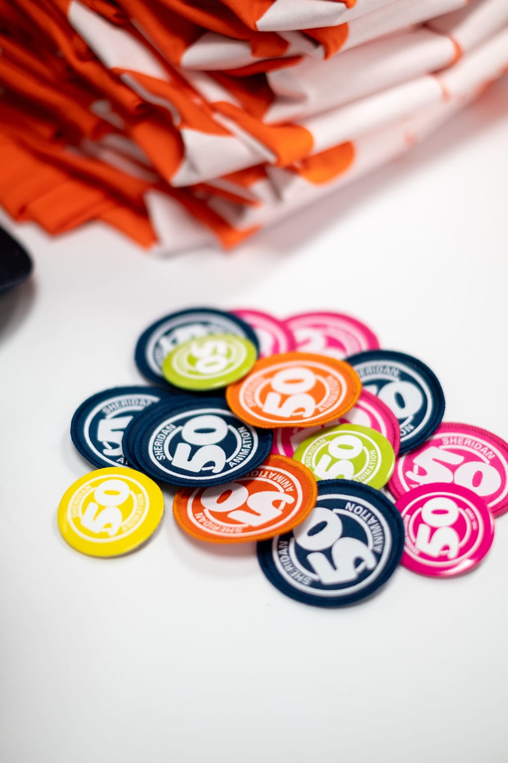 Colourful Animation 50 buttons on a white table