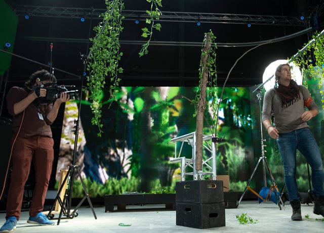 Students shooting a film in front of an LED volume