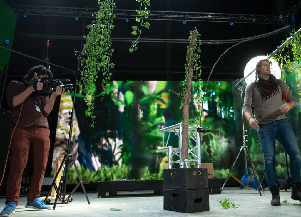 Students shooting a film in front of an LED volume